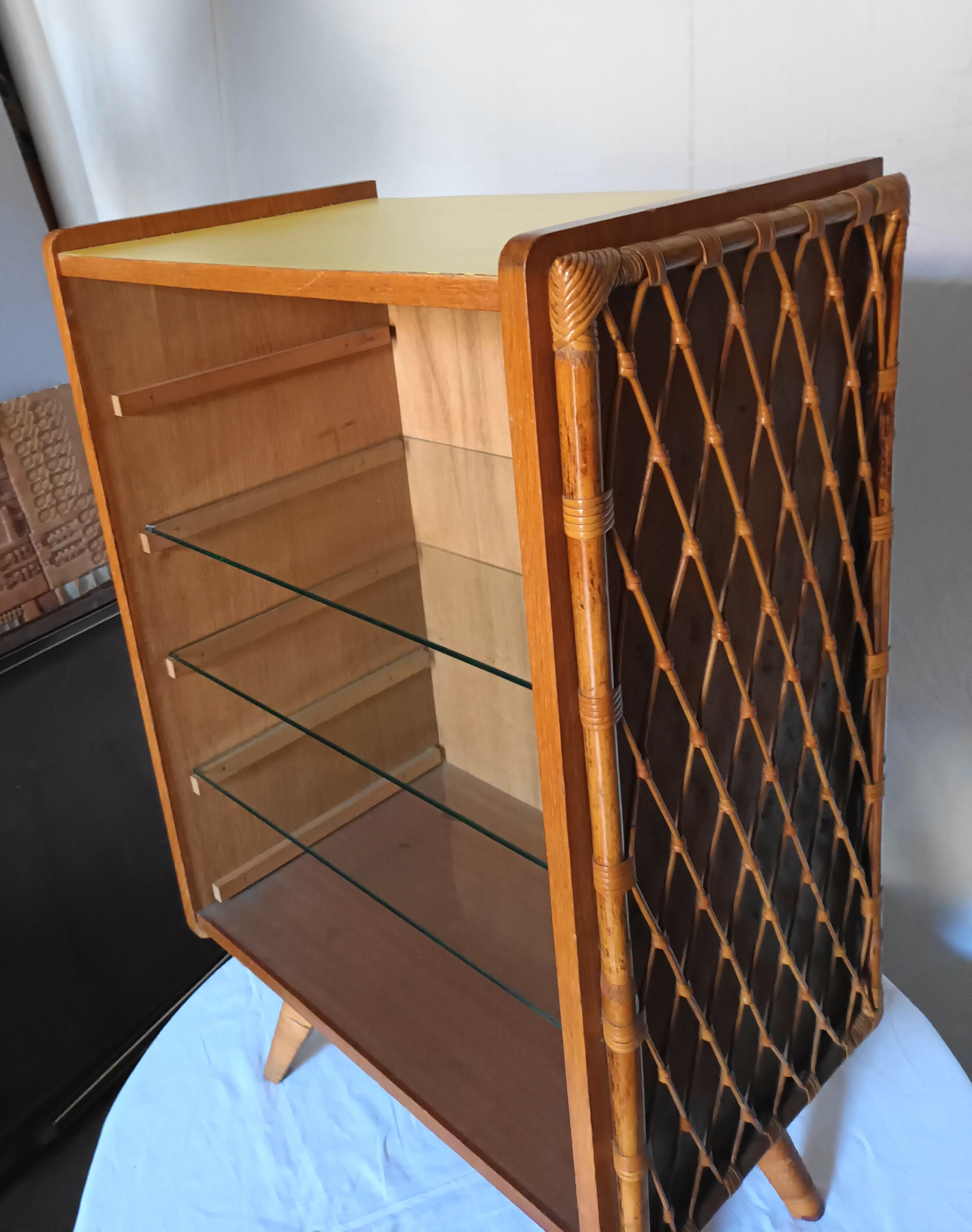 Bibus has 3 wooden and bamboo shelves from the 50s