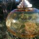 Vintage suspension ball in amber glass