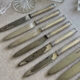 12 antique Christofle knives.