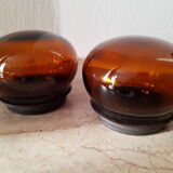 Pair of vintage amber glass jars