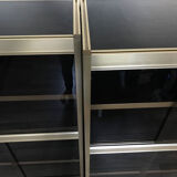 Shelves of black and gold windows