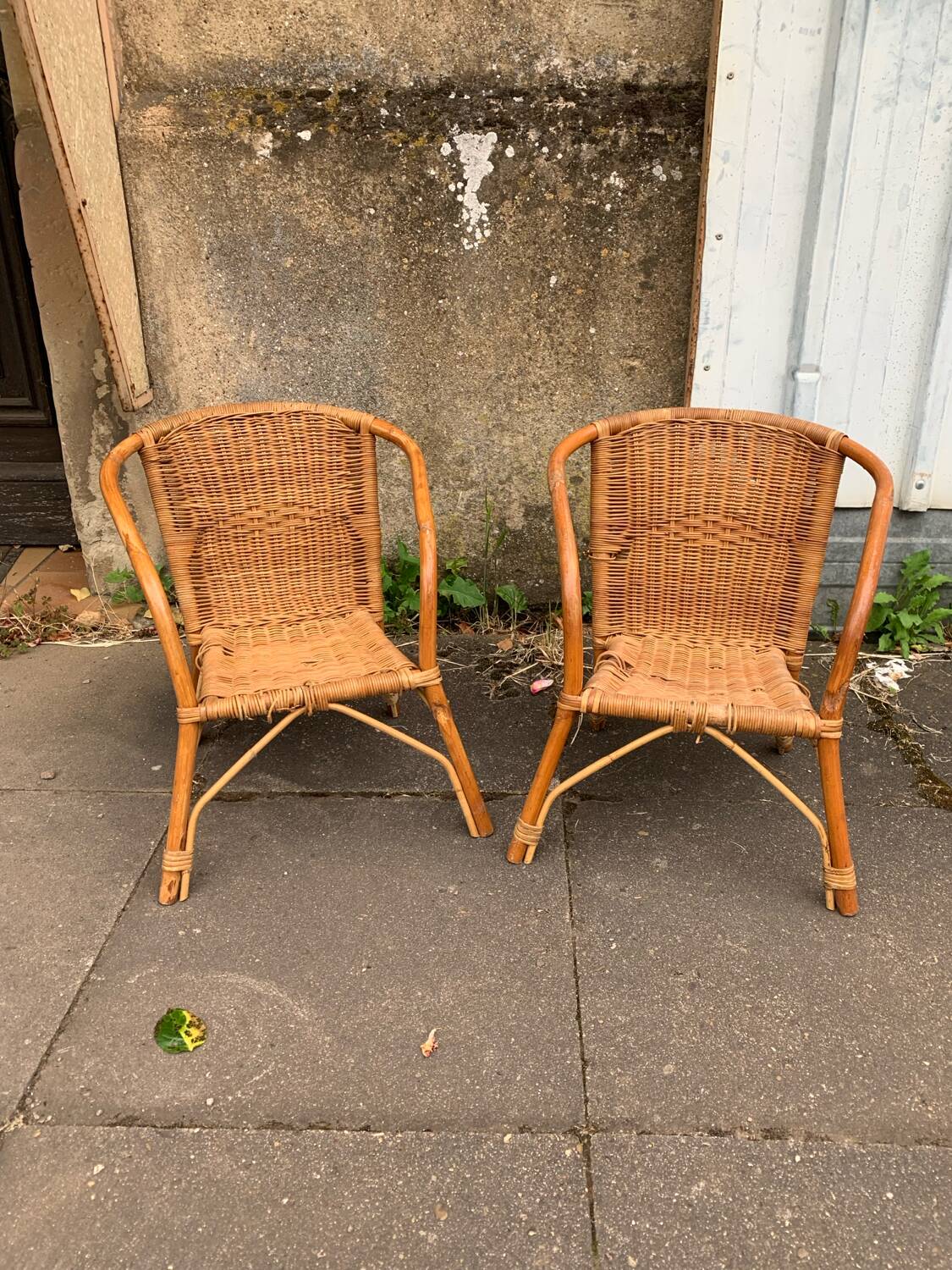 Pair of vintage children's wicker chairs