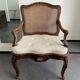 Regency canned armchair in carved walnut