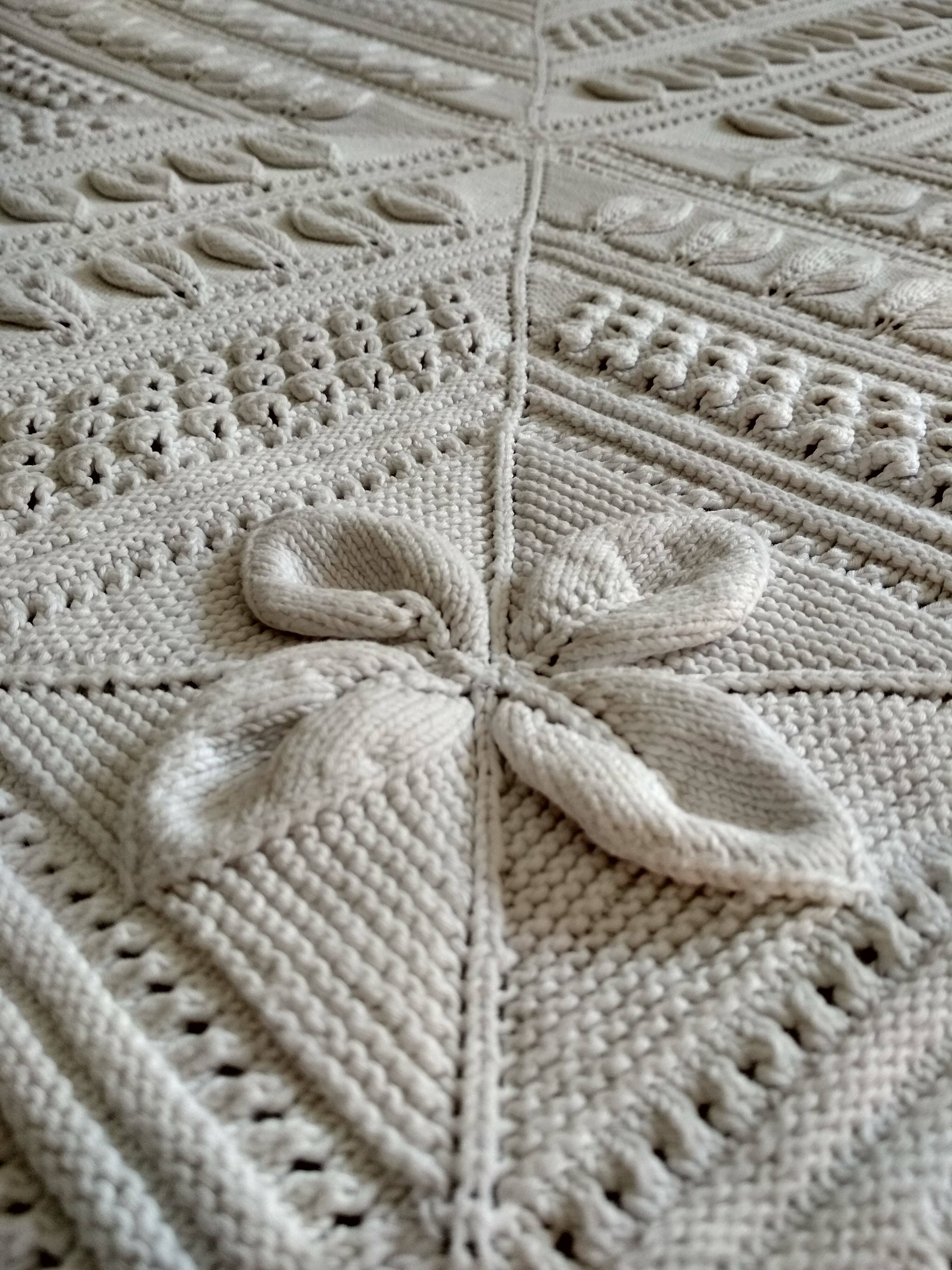 Knitted white cotton bedspread