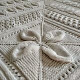 Knitted white cotton bedspread