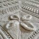 Knitted white cotton bedspread