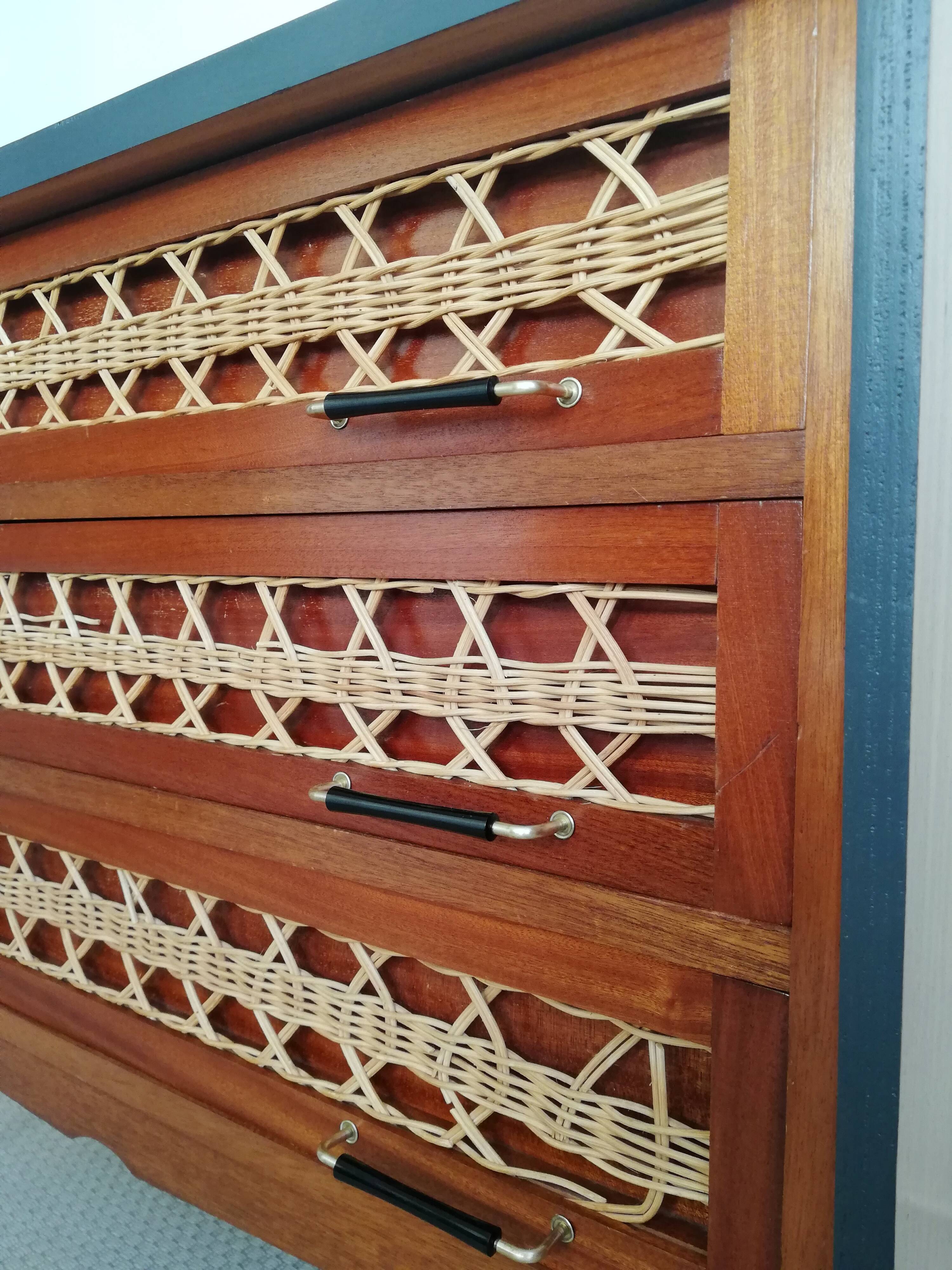 Teak and rattan chest of drawers feet compass