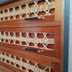 Teak and rattan chest of drawers feet compass
