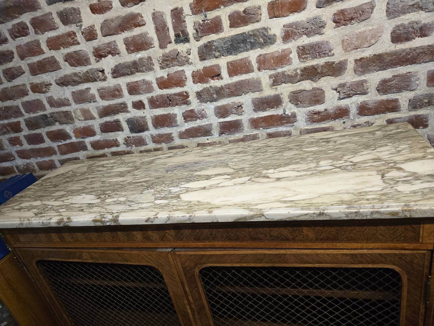 Marquetry bookcase with marble top