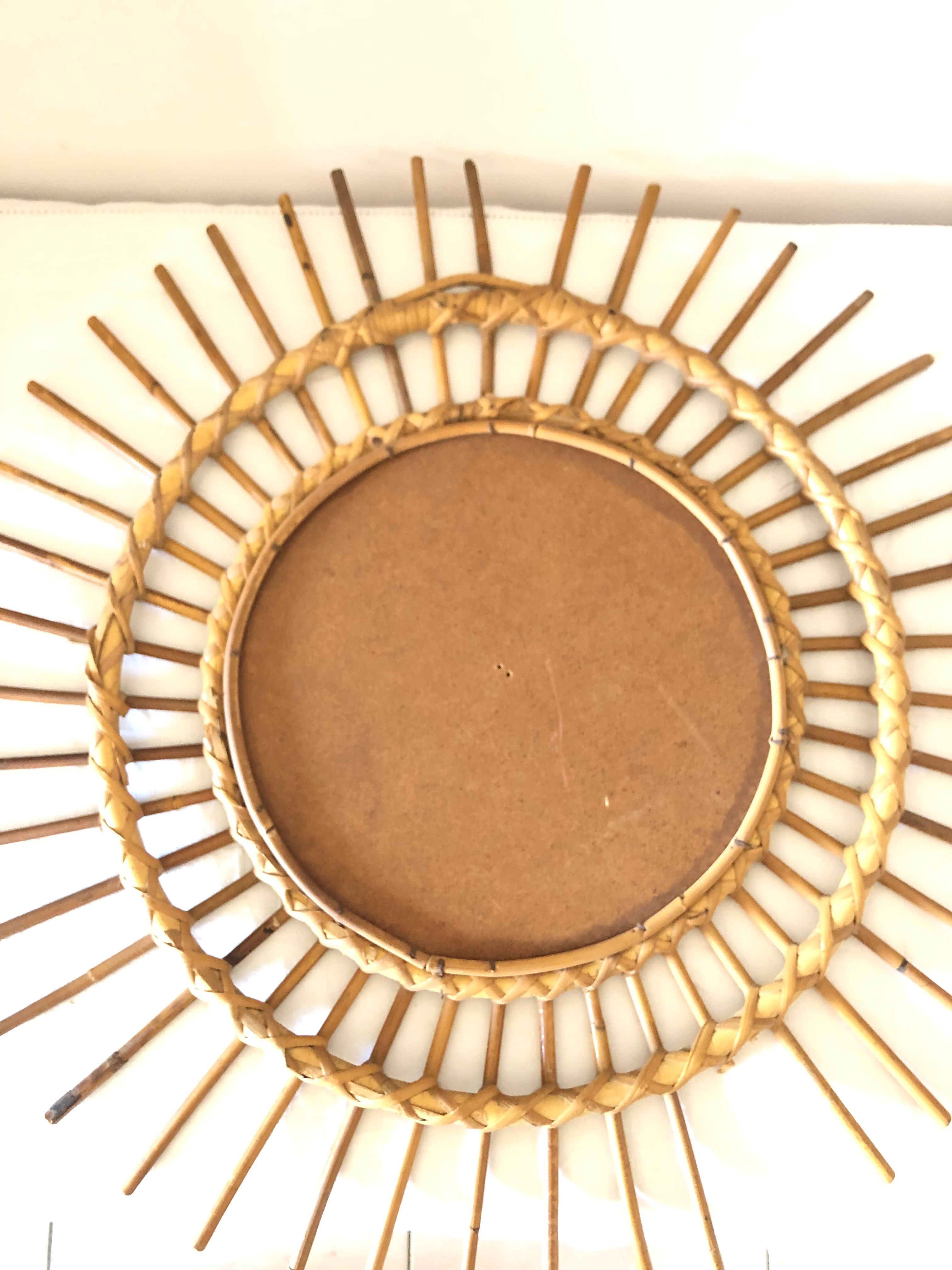 Vintage wicker rattan sun mirror