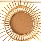 Vintage wicker rattan sun mirror