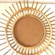 Vintage wicker rattan sun mirror