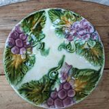 Old barbotine plate with vine motif