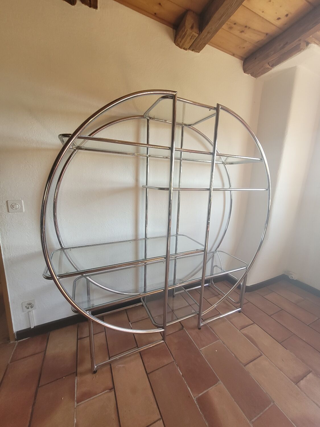 Bauhaus-style chrome round shelf