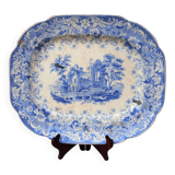 Grand plat décoratif en faïence bleue avec ruine d'abbaye début XIXe siècle.