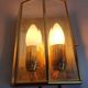 Pair of Italian gold-plated brass wall sconces with beveled glass