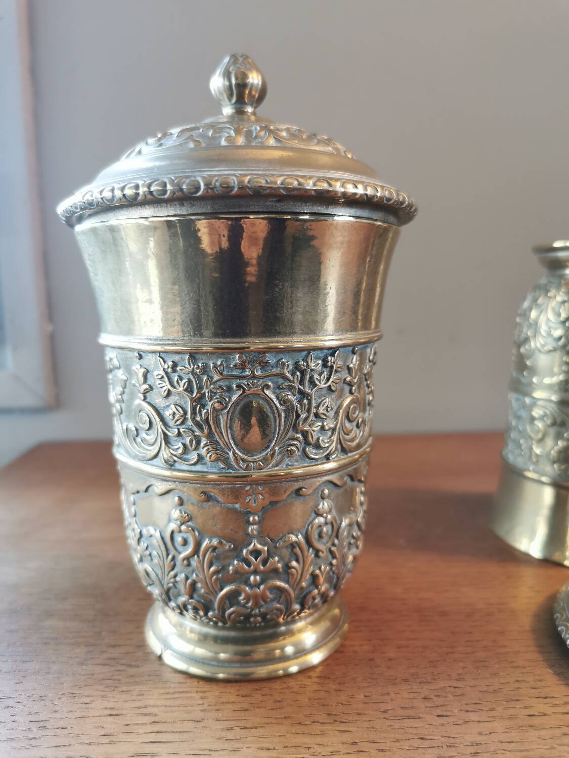 Pair of antique chiseled metal candy boxes