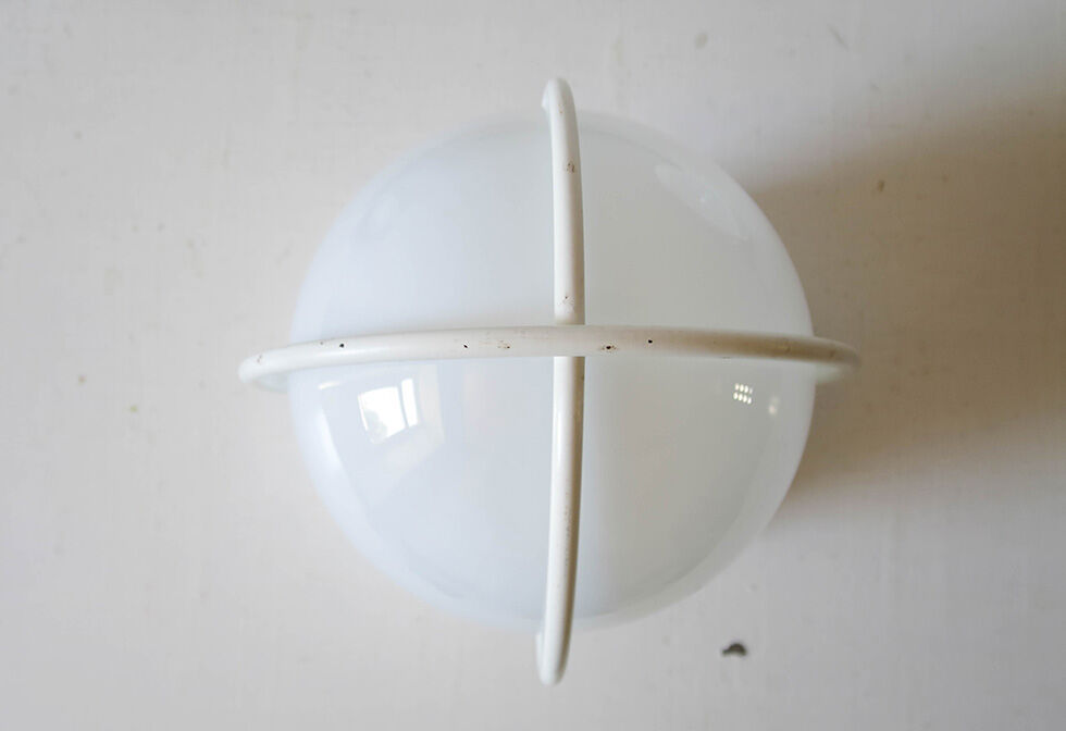 Lot of three globe wall sconces