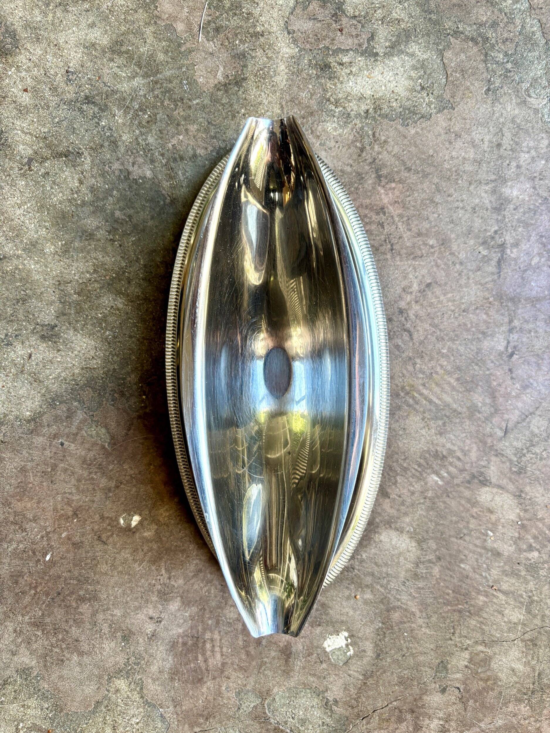 Silver stainless steel gravy boat