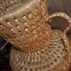 Large beige (wheat) woven wicker floor vase, Mid-Century style from the 1940s.