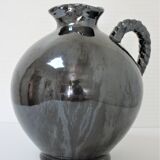 Black pearl glaze ceramic pitcher by Reinhold Rieckmann signed