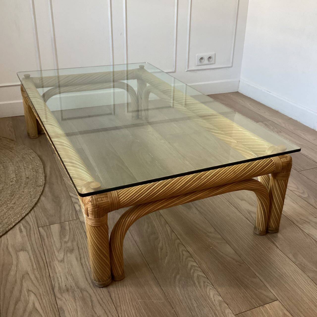 Large rattan and glass coffee table
