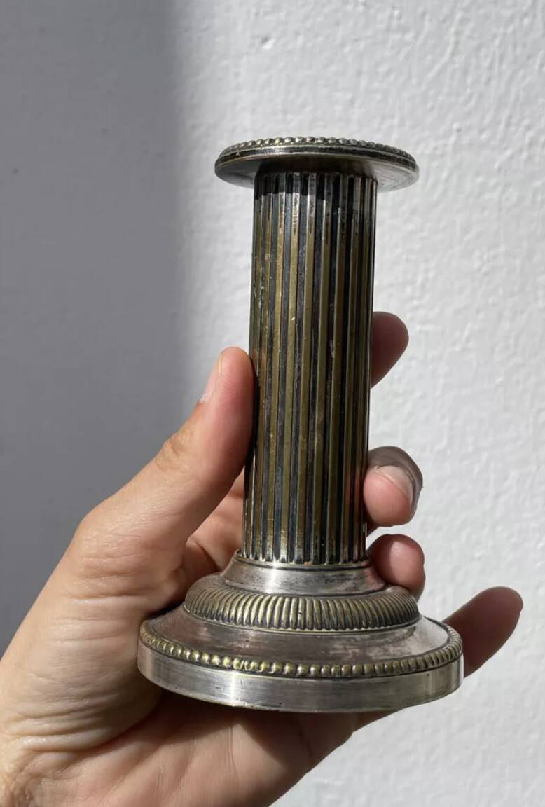 Pair of 19th-century fluted silver-plated metal candlesticks