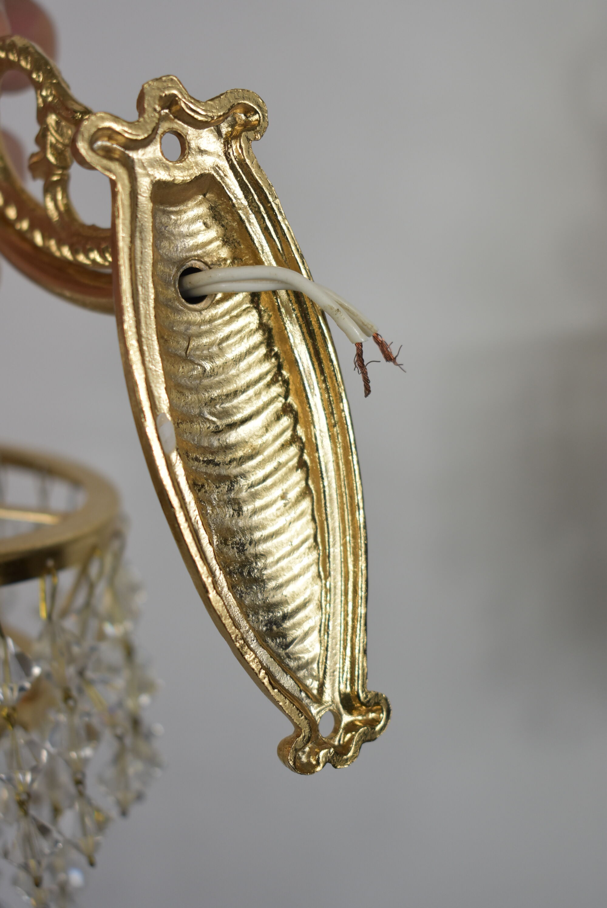 Pair of gold wall light with stamps