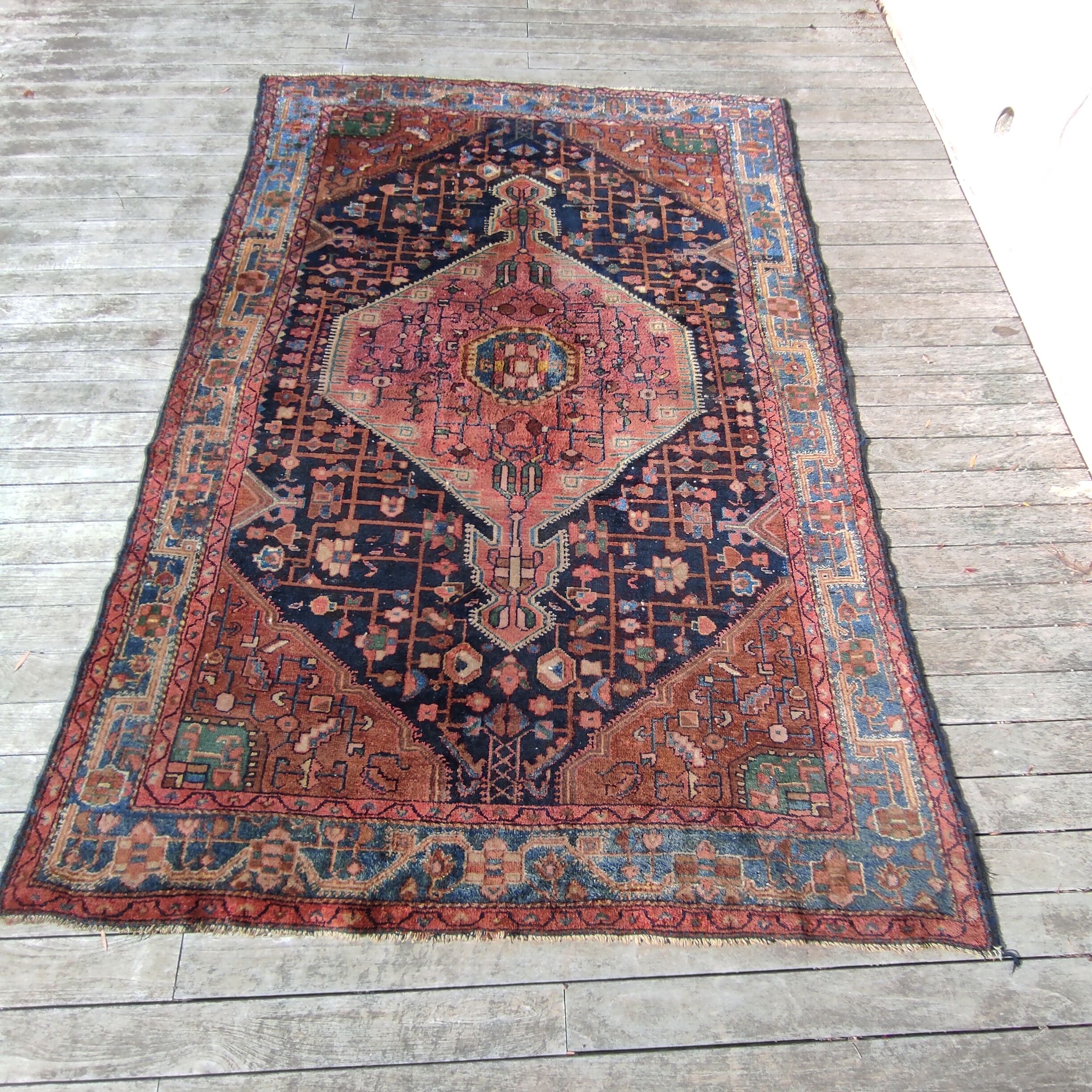 Old Persian carpet 1.62 m wide and 2.33 meters long