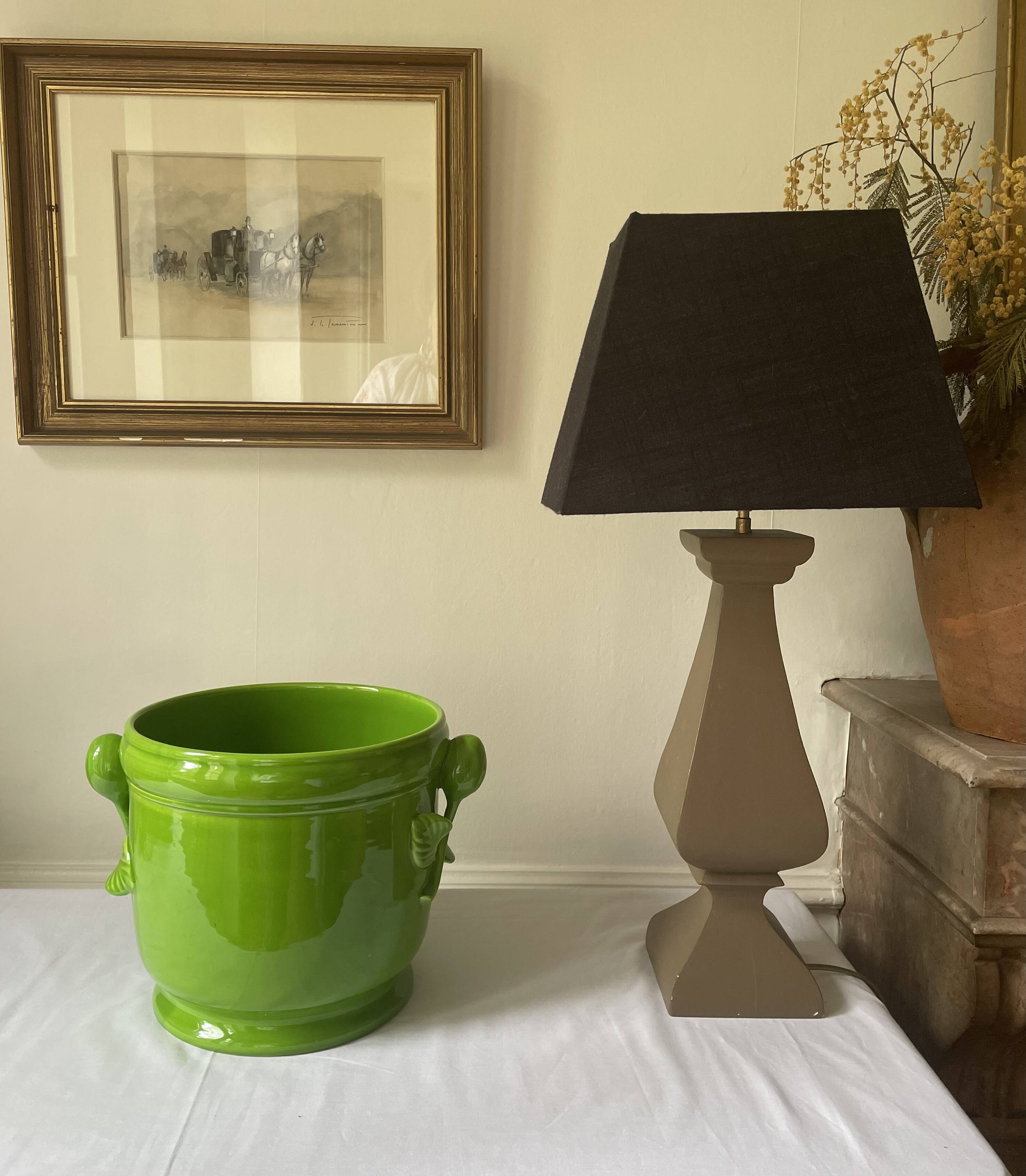 Glazed green pot cover in the style of Moreau Bourg earthenware