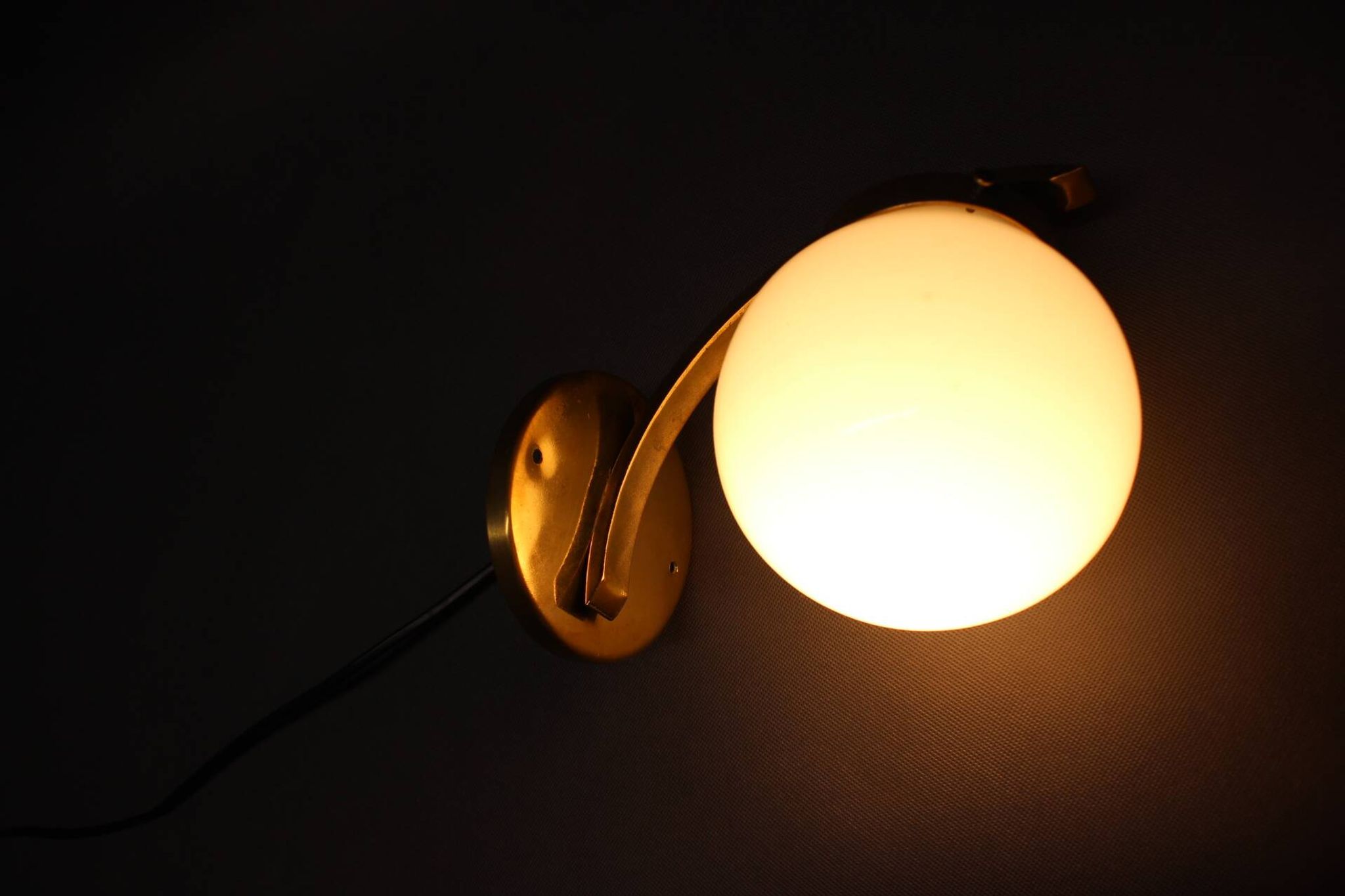 Pair of Art Deco wall sconces in brass and opaline glass, Europe, 1930s
