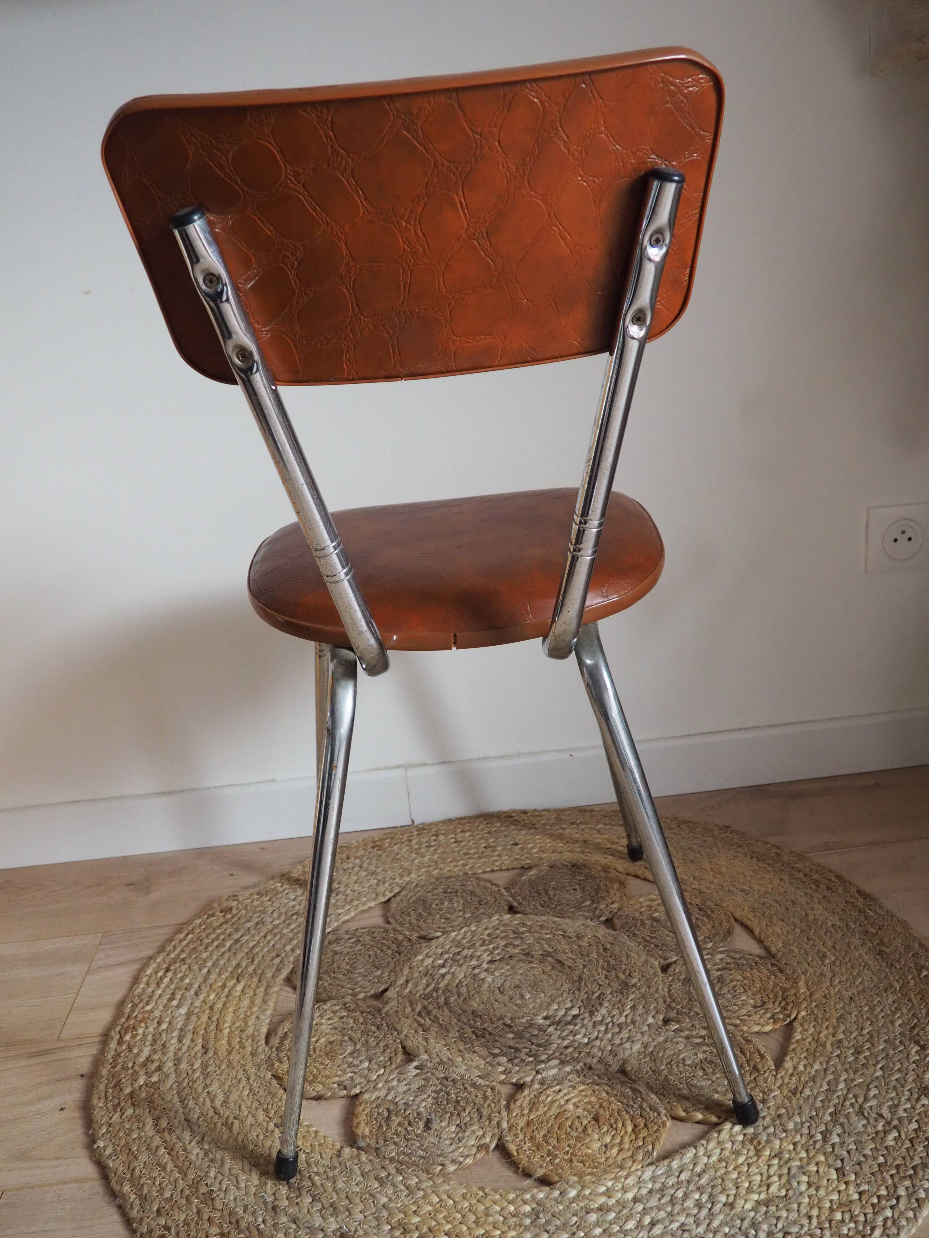 Brown faux leather chair