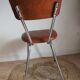 Chaise en simili cuir marron