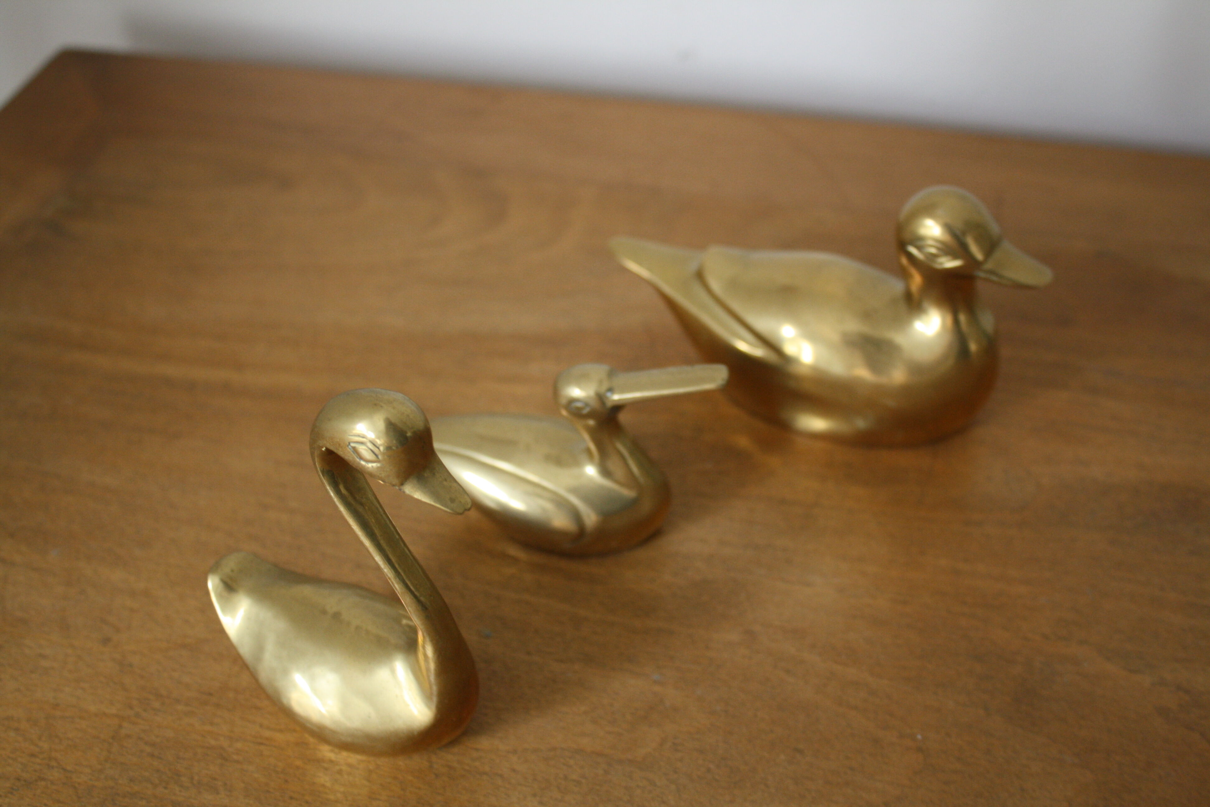 Set of 2 ducks and 1 brass swan