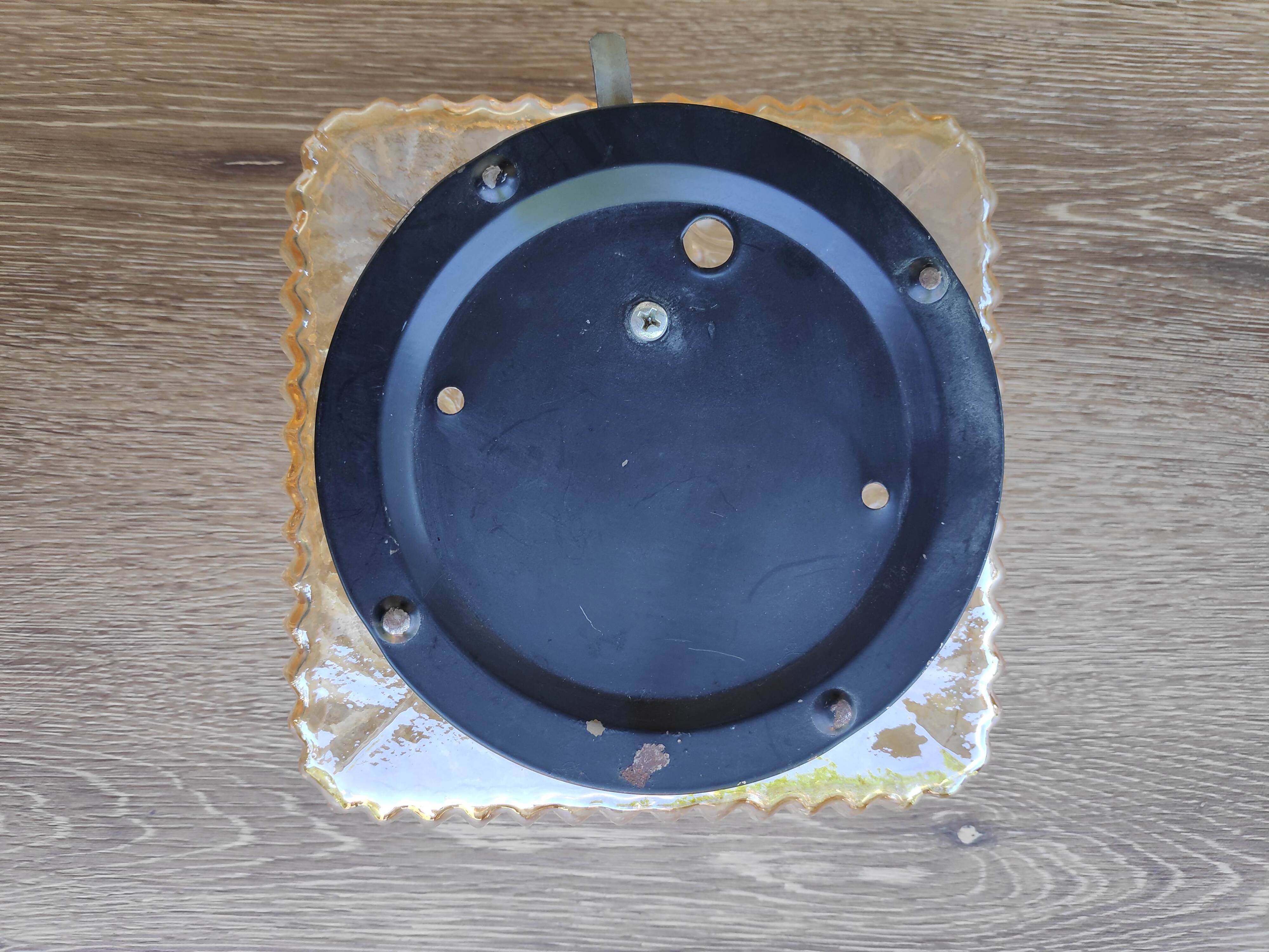 Amber ceiling light in thick glass