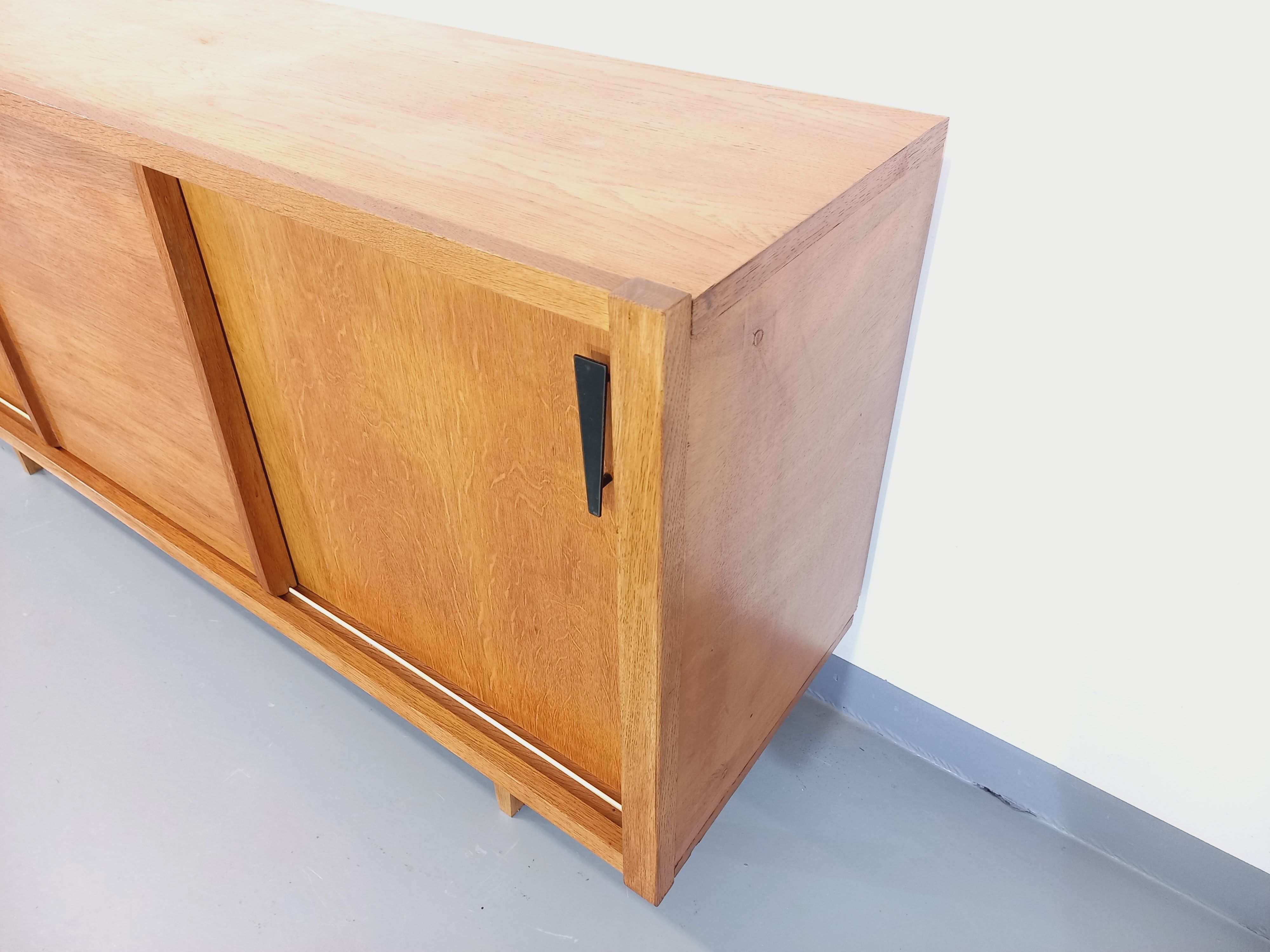 Vintage row in light oak wood from the 60s