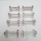 Set of 8 knife holders in sleek old glass