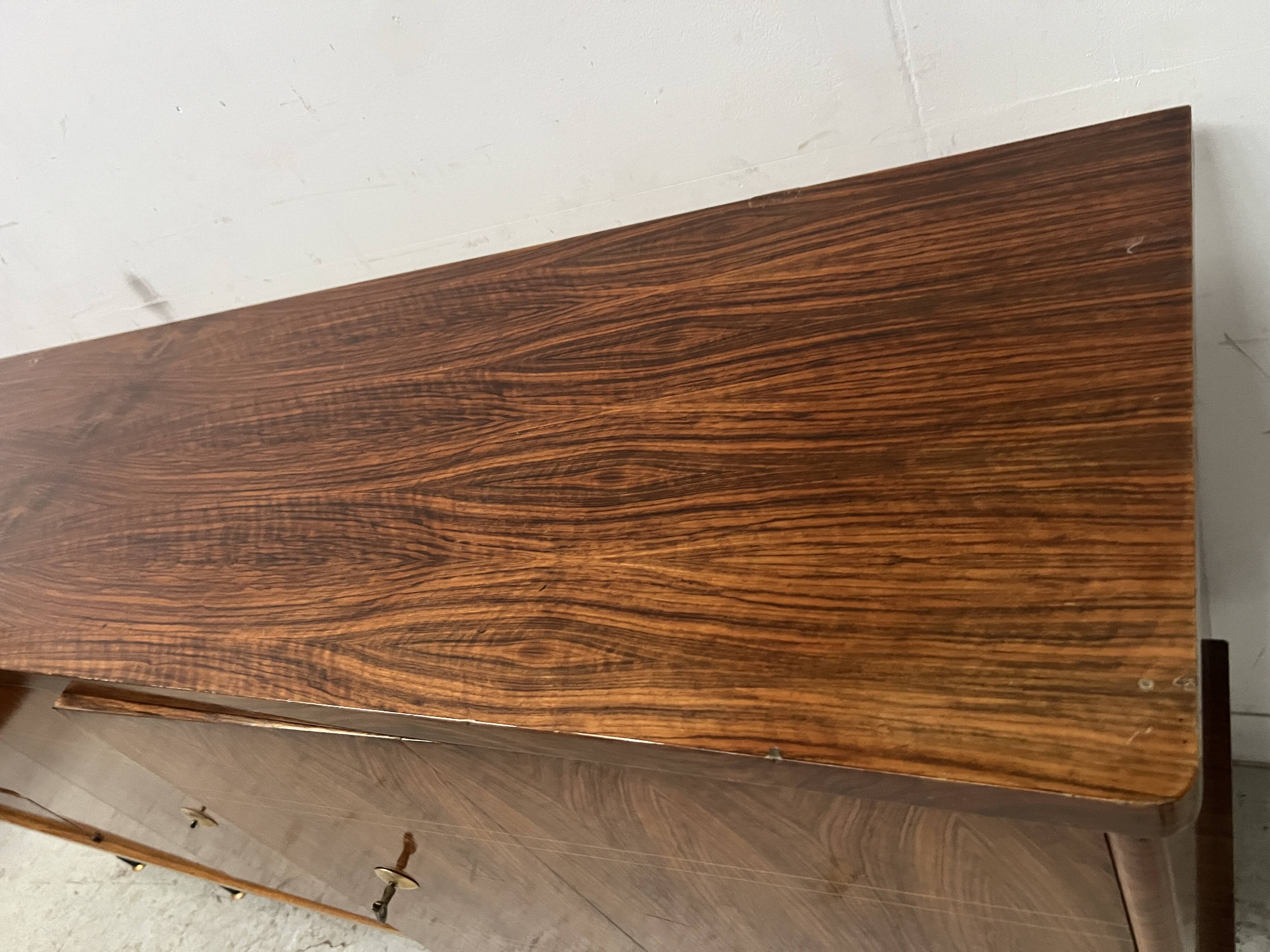 Scandinavian enfilade in veneered wood with iron legs, 20th century.