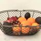 Basket in wire mesh and wood