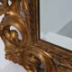 Grand miroir mural richement décoré de style baroque italien du XXe siècle