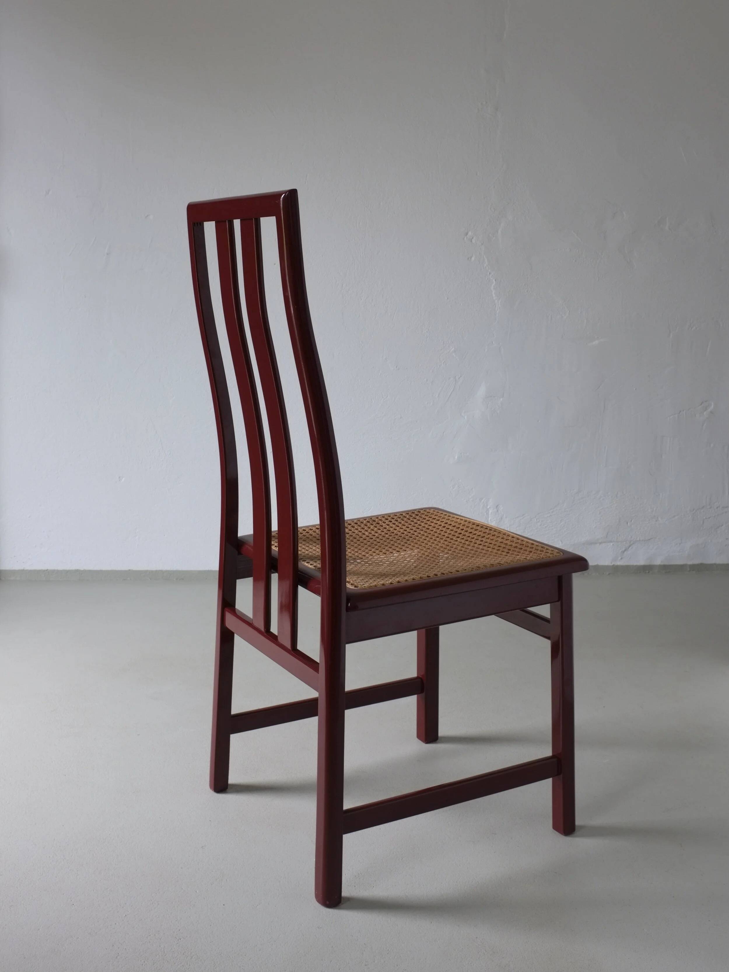 4 Glossy wine red cane seat chairs | Italy | 1970s