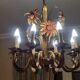 Set of painted metal chandeliers with flower decor
