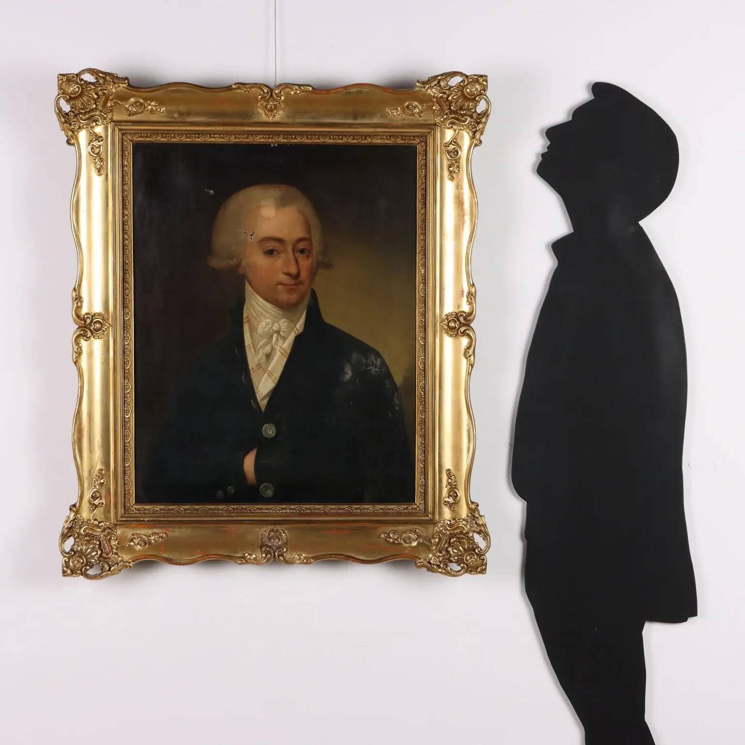 Old painting of a male portrait in oil on canvas from the 18th-19th century.