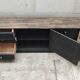 Low TV cabinet with black patina, twelve drawers and one door