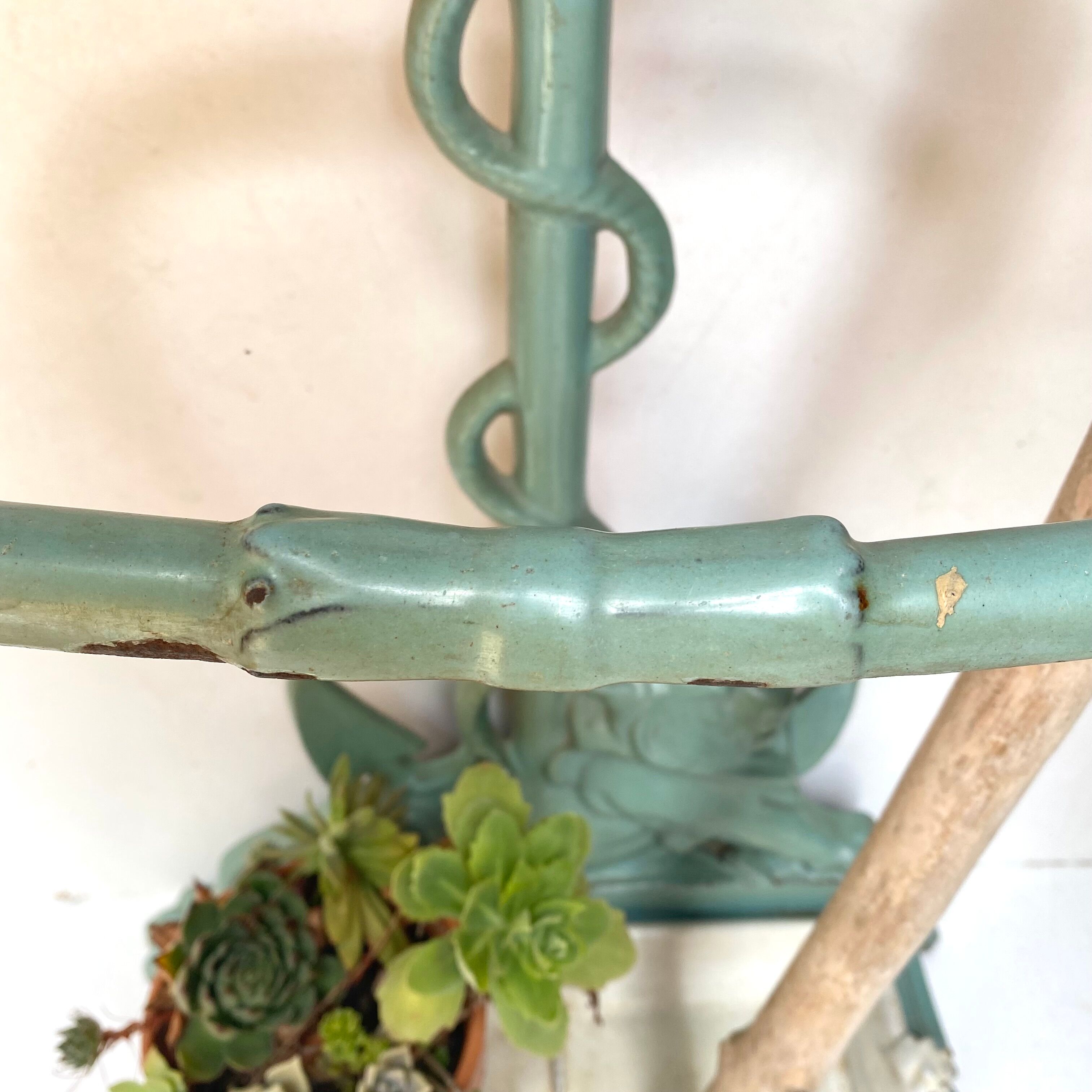 Enameled cast iron umbrella stand from the early 20th century