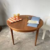 Scandinavian round teak table with extension