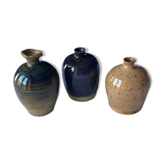 3 stoneware ceramic vases signed