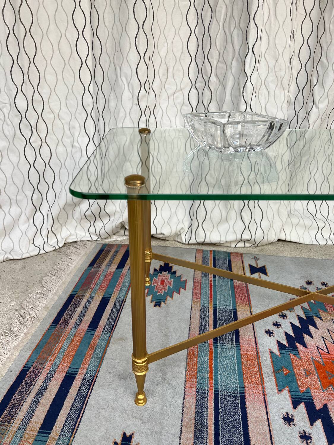 Vintage gold coffee table. Glass top.