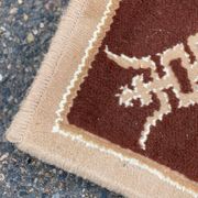 Persian rug in beige wool with woven flowers 290x190cm