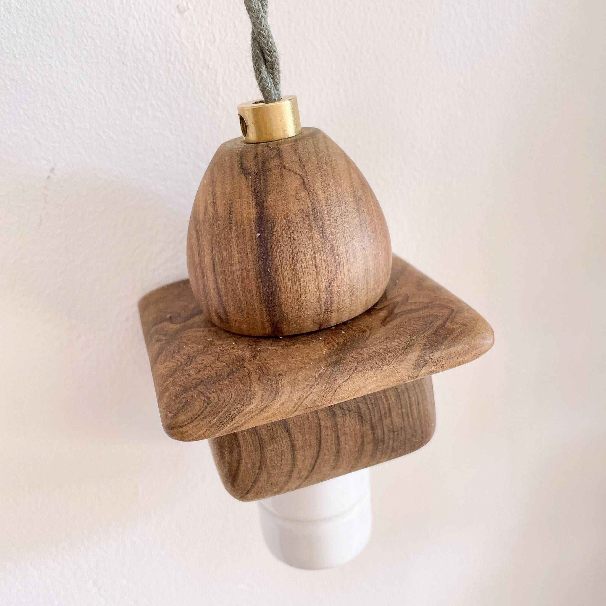 Wooden portable lamp with green cable